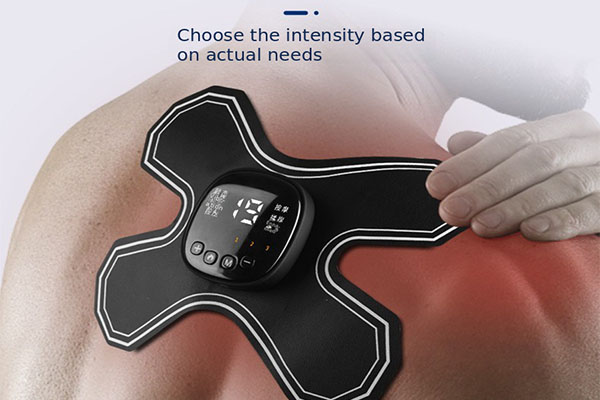 A person relaxing after a workout with a heating pulse patch on their shoulder